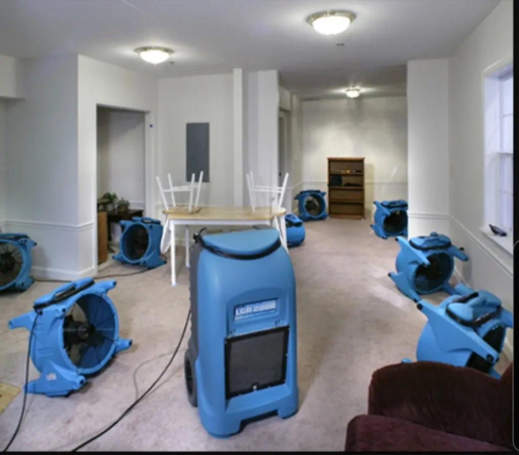 Air movers and dehumidifier setup for Water Damage Restoration in Park City